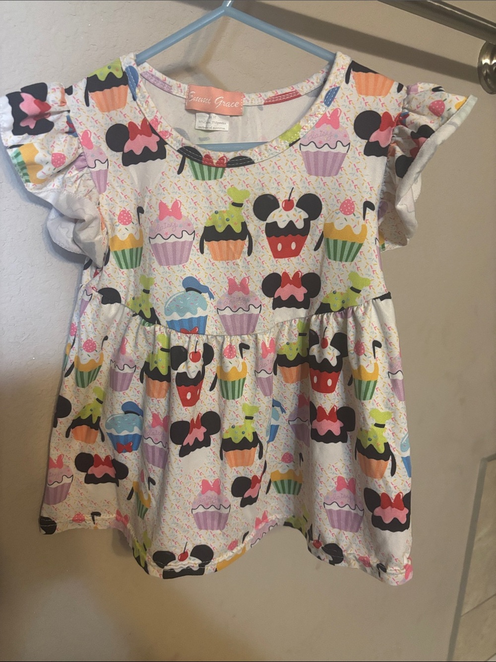 Disney themed cupcake boutique top